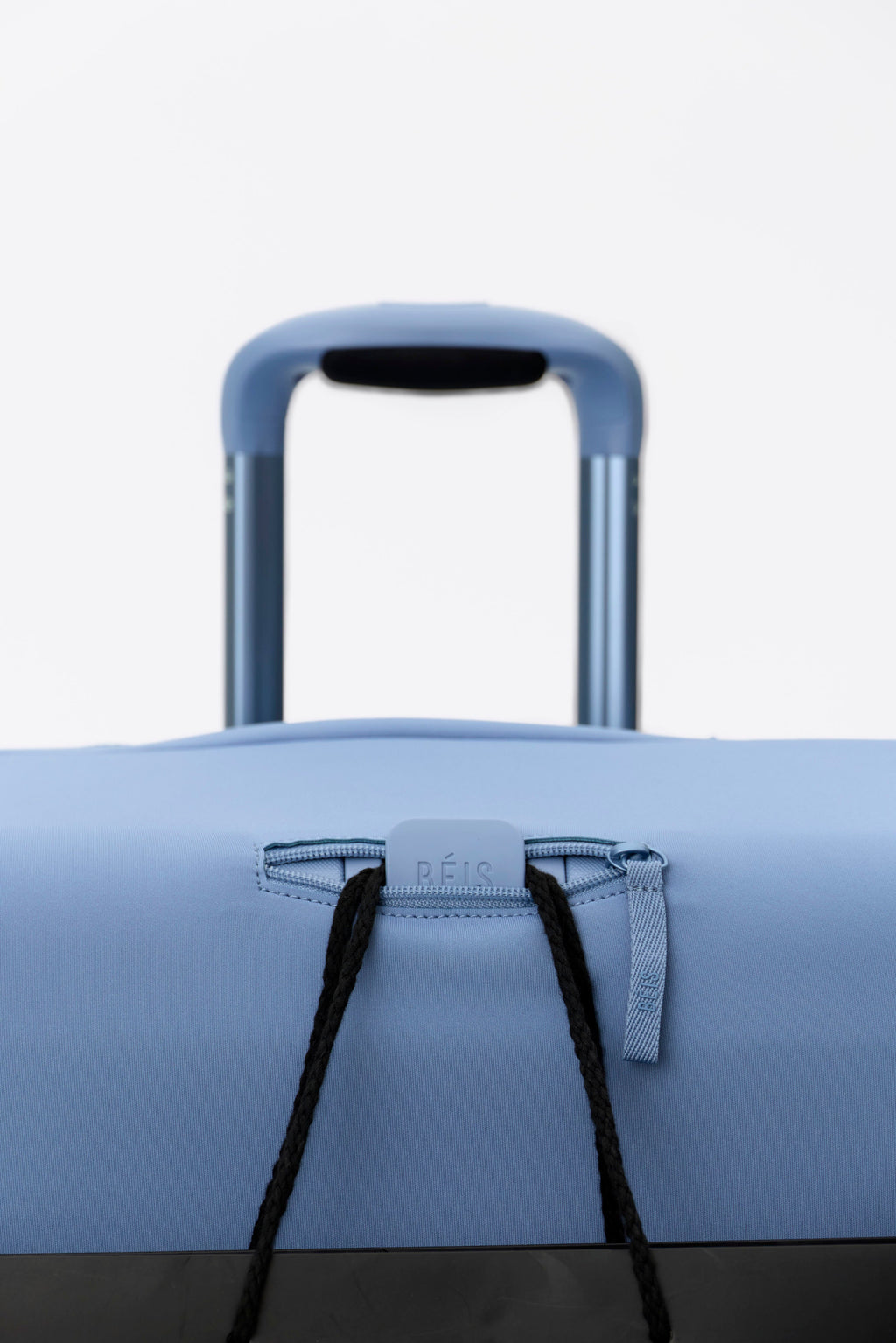 The Hybrid Carry-On Luggage Cover in Dusty Blue