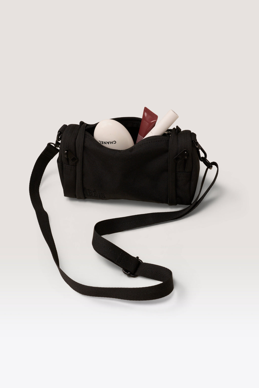 The Expandable Crossbody Charm in Black