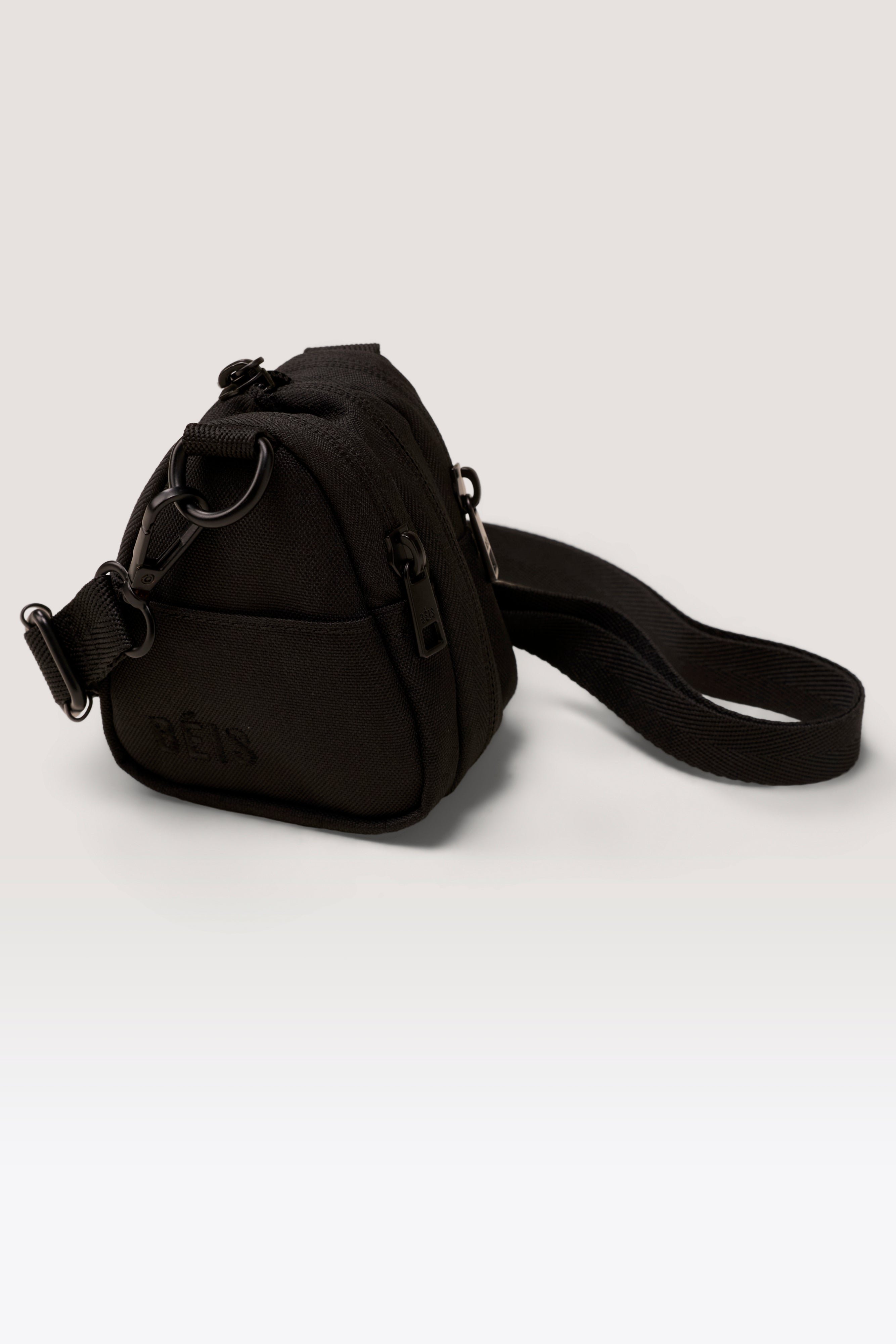 The Expandable Crossbody Charm in Black