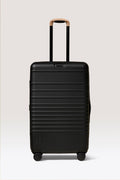 The Medium Check-In Roller in Black