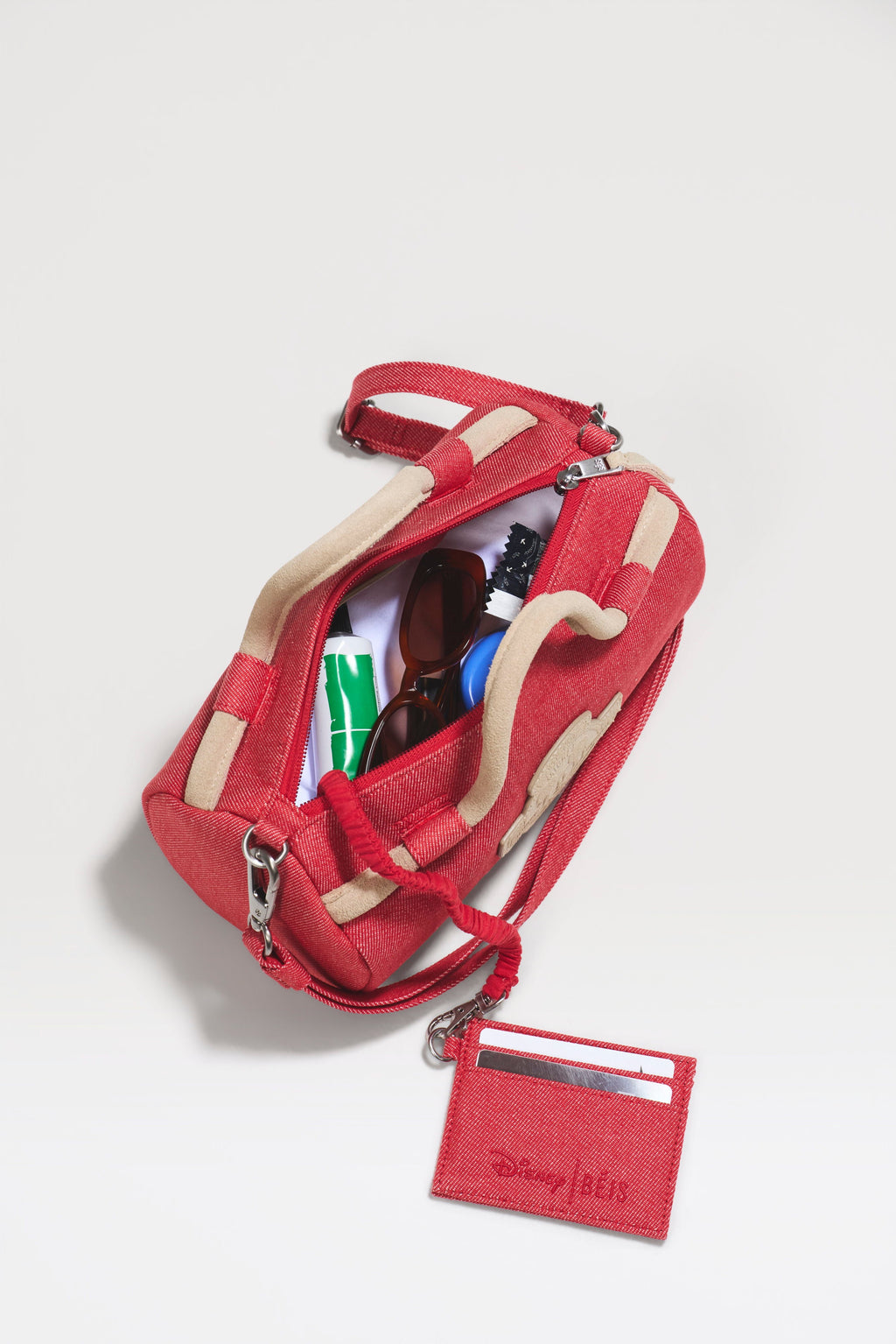 The Disney Small Duffle in Red Jeans